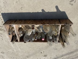Old Wooden Box With Bottles
