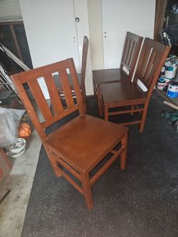 Solid wood dining chairs x 4