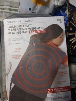 Calming heat massaging heat pad
