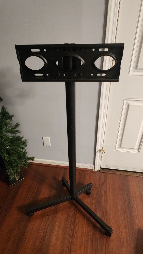 Mobile TV Stand. Comes With TV Hooks