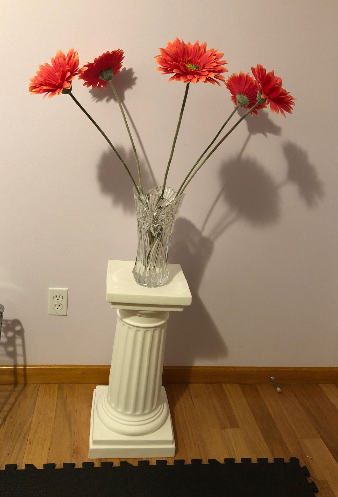 White column and flowers