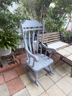 Wooden chair rocking