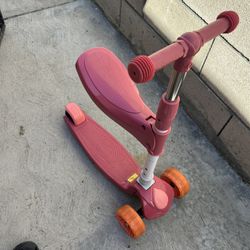 three-wheeled kick scooter