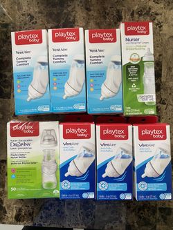 Assortment of Playtex baby bottles