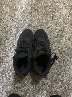 Black Cat Jordan 4s