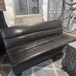 Brown faux leather futon sofa bed 