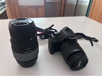 Canon Eos rebel sl1 camera kit with 2 lenses & bag