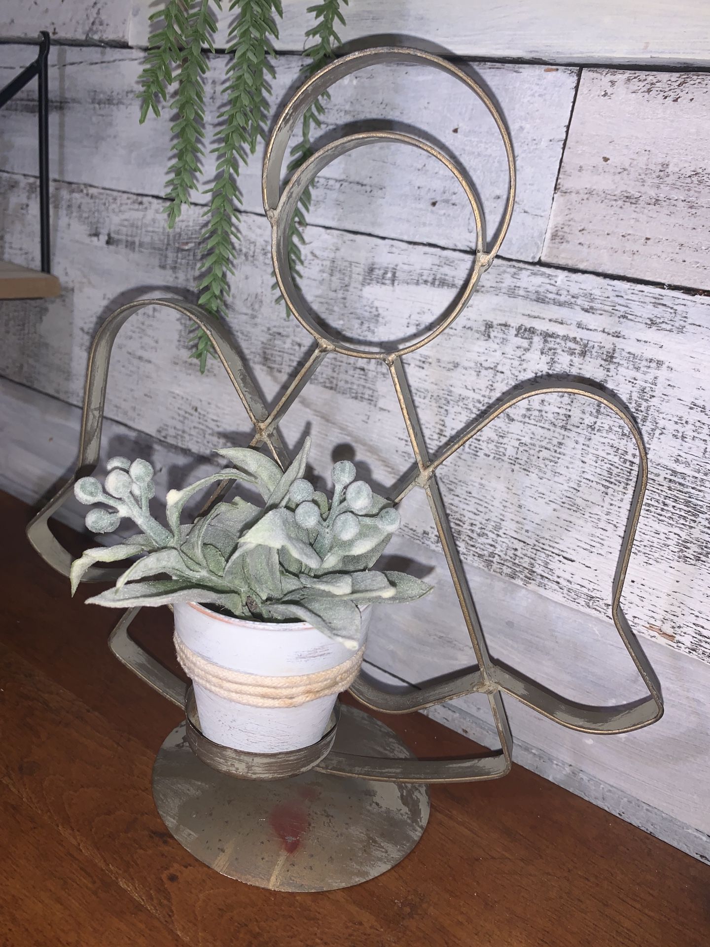 Metal angel candle holder with mini painted pot and floral