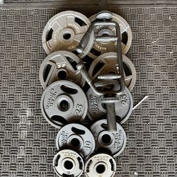 Olympic weights 200lbs total plus tricep bar