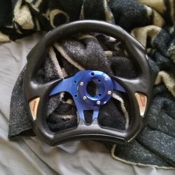Helmet And Sterring Wheel
