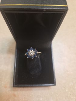 14 k White Gold Sapphires and diamond ring.  Weight is 3.2 grams
