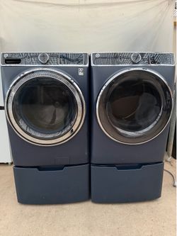 GE washer and electric dryer laundry set