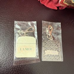 La Mer Gold and Silver Keychain Duo
