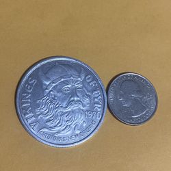 Selling a 1972 aluminium collectible coin, asking for $10 