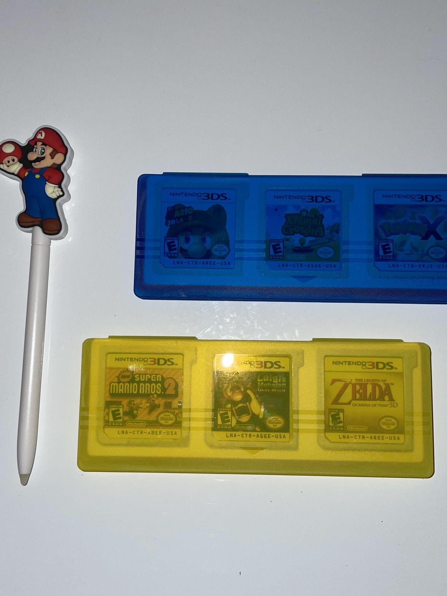 Nintendo 3DS Super Mario Stylus and Game Cases. Yellow Blue Travel