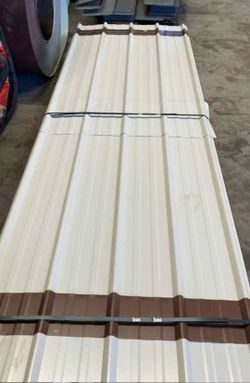 Roofing metal panels