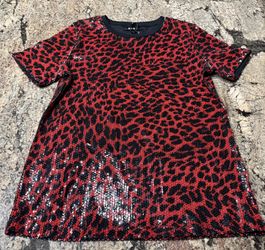 NEW DKNY WOMEN’S SIZE SMALL RED AND BLACK ANIMAL PRINT SEQUIN TOP. THERE IS A LOT OF STRETCH IN IT FABRIC IS 95% COTTON AND 5% SPANDEX.