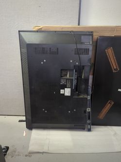 Phillips 52-in plasma TV very heavy. There's no base for it.