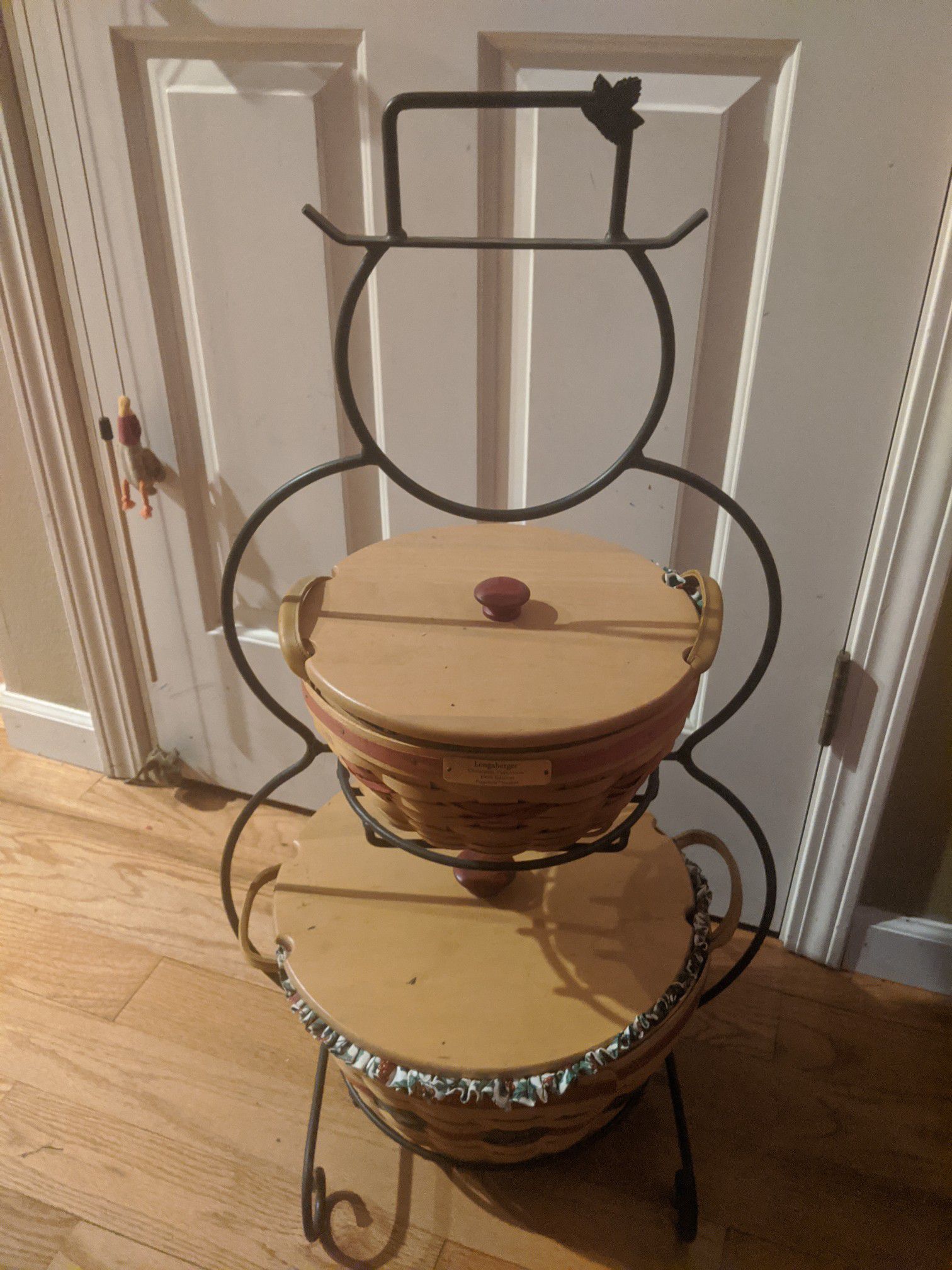 Longaberger snowman iron stand and 2 baskets with liners and lids