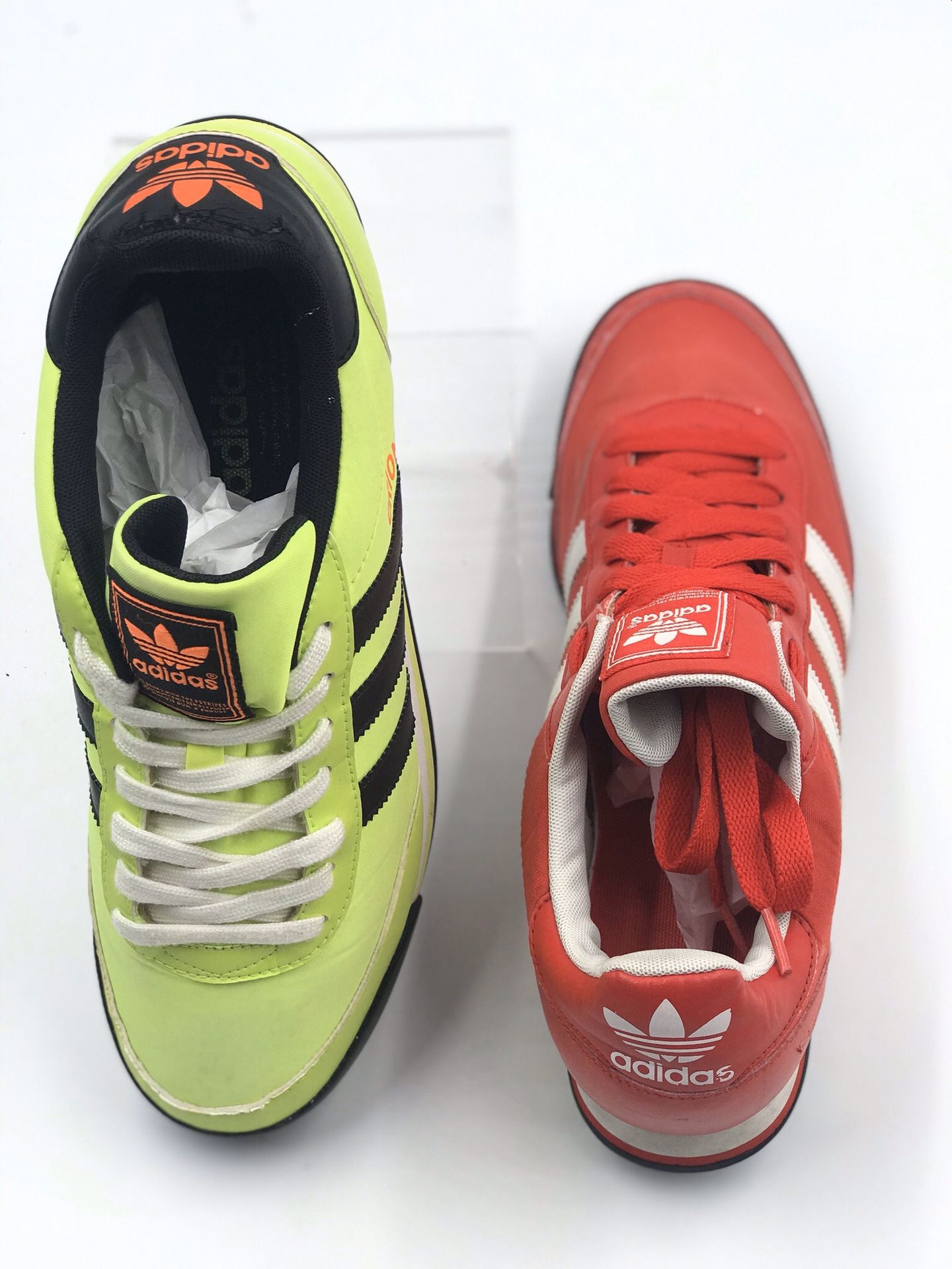 2 pair of Adidas men size 11! Great condition! 1 Bright- 1 Red! Sold together only!