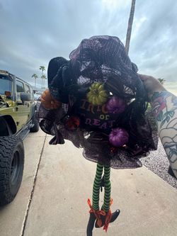 Halloween wreath with witch legs