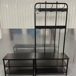 Coat rack with shoe storage benches.