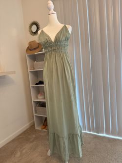 Long green dress with straps