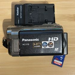 Panasonic HC-V10 handheld compact camcorder tested works Includes 32GB memory card, charger, battery