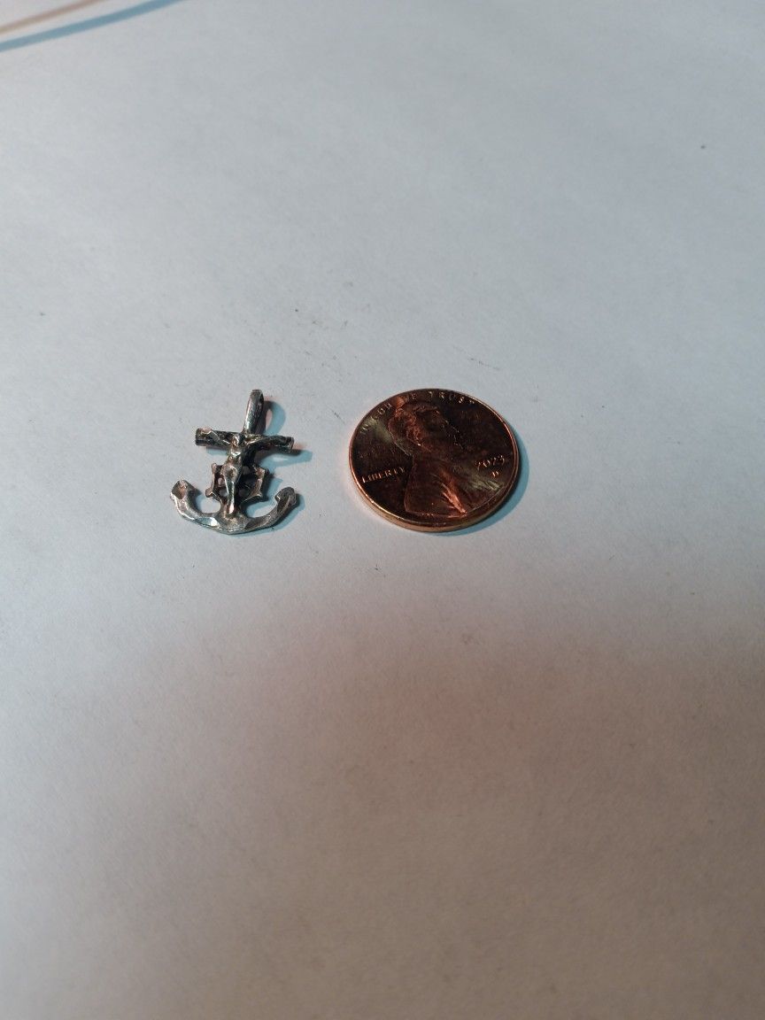 Sterling Silver Jesus On A Archer Vintage Pendant.