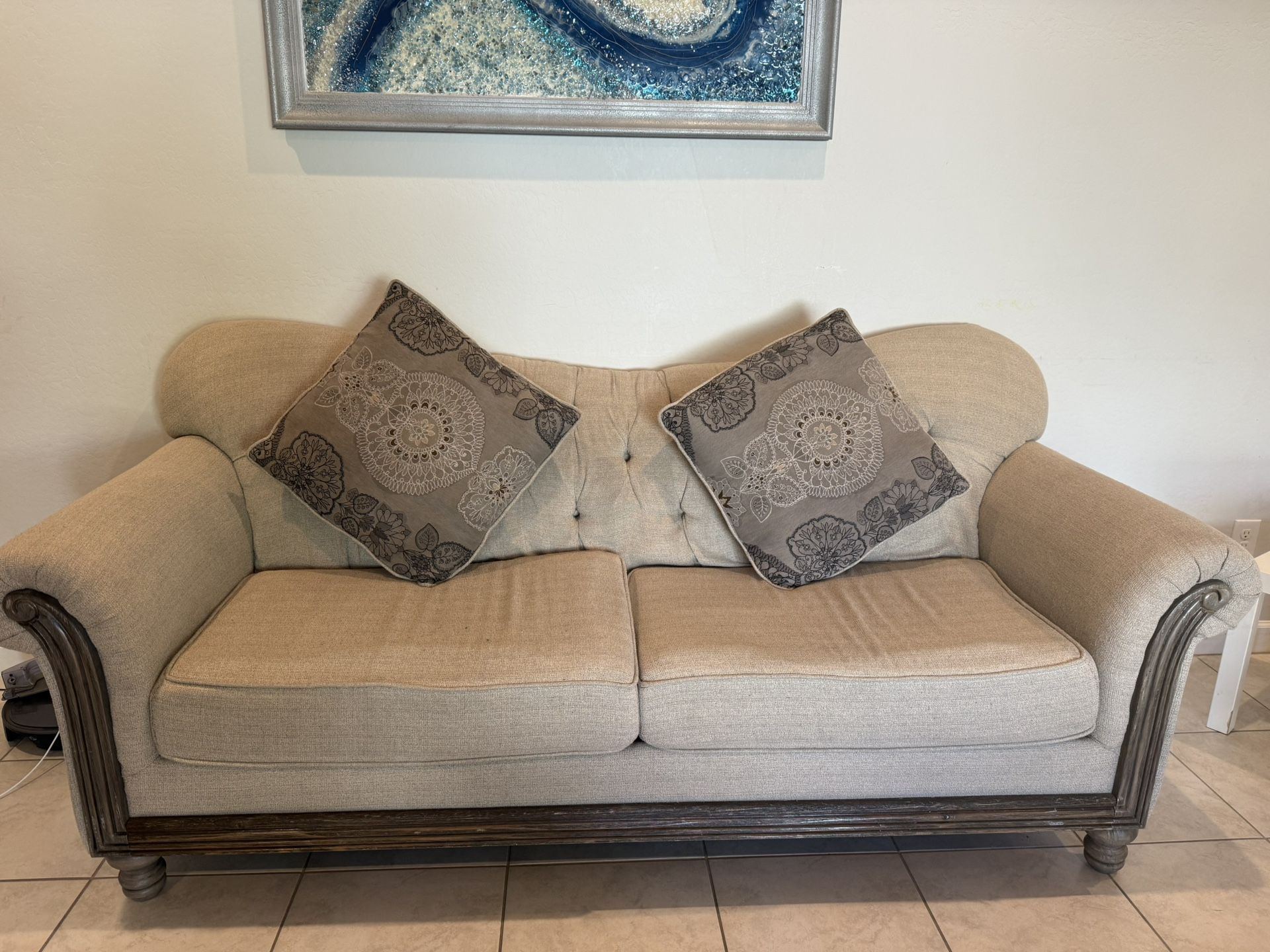 Cozy Beige Sofa with Decorative Cushions