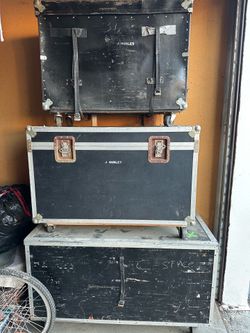 Three road cases with casters