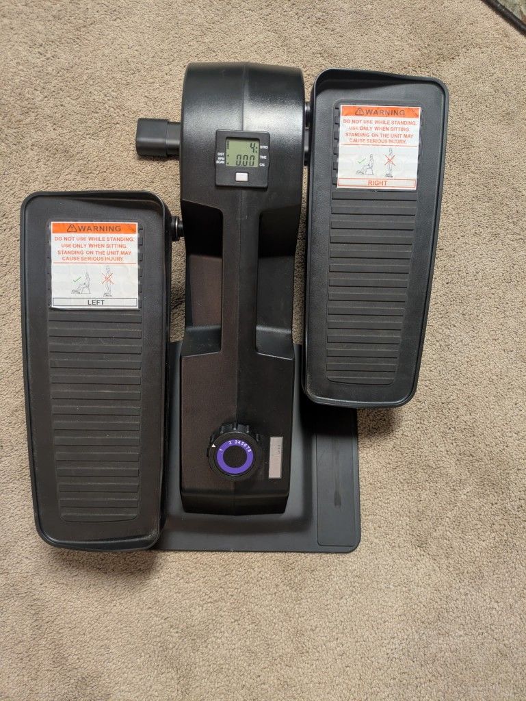 Cubii Work+Out compact under desk elliptical.
Model F3A2.