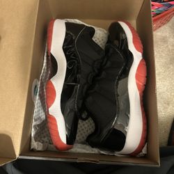Jordan 11 Low Bred