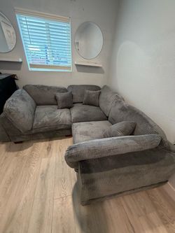 New beautiful gray sectional sofa
