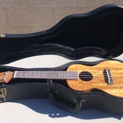 Leolani C85G Concert Ukulele with Hard Case – Koa Finish   Condition: Pre-owned, well kept, plays great Includes: Ukulele + hard case only Pick up onl