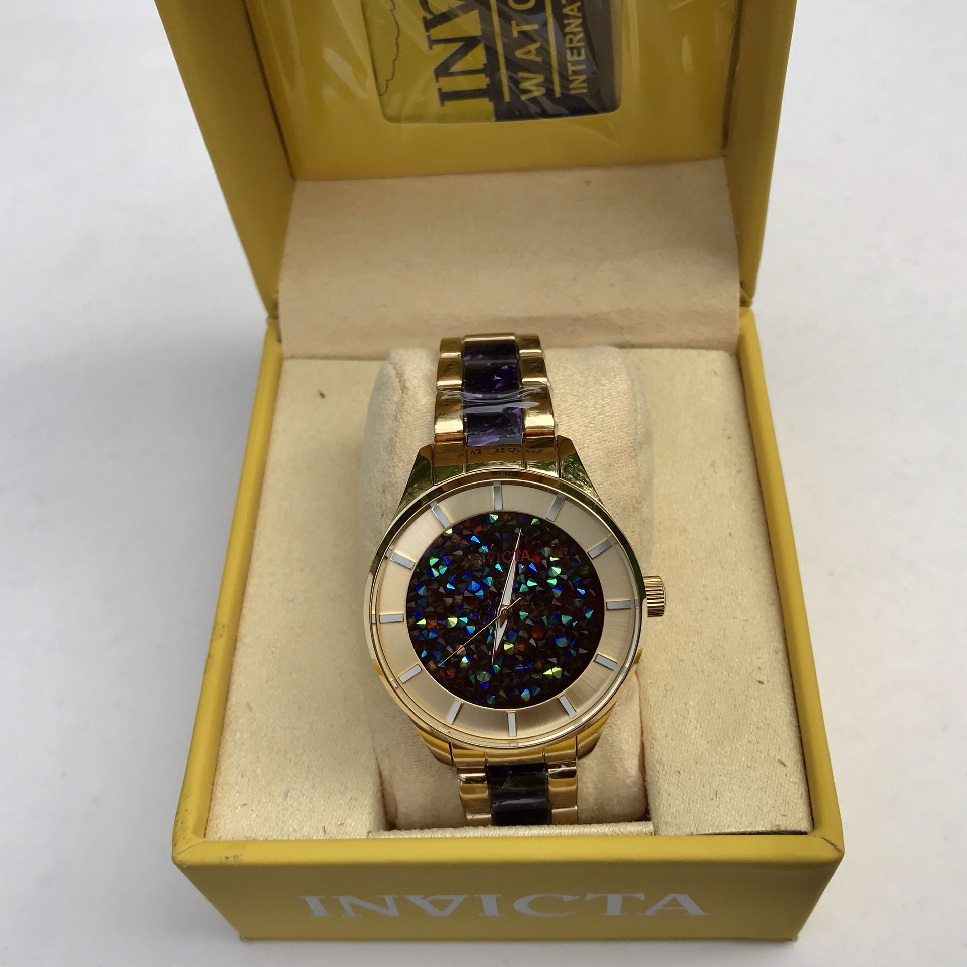 Brand New Invicta women’s Watch in original yellow box & passport