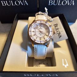 NEW NICE LADIE'S LUXURY GOLD TONE WITH WHITE LEATHER BAND ORIGINAL BULOVA WATCH.