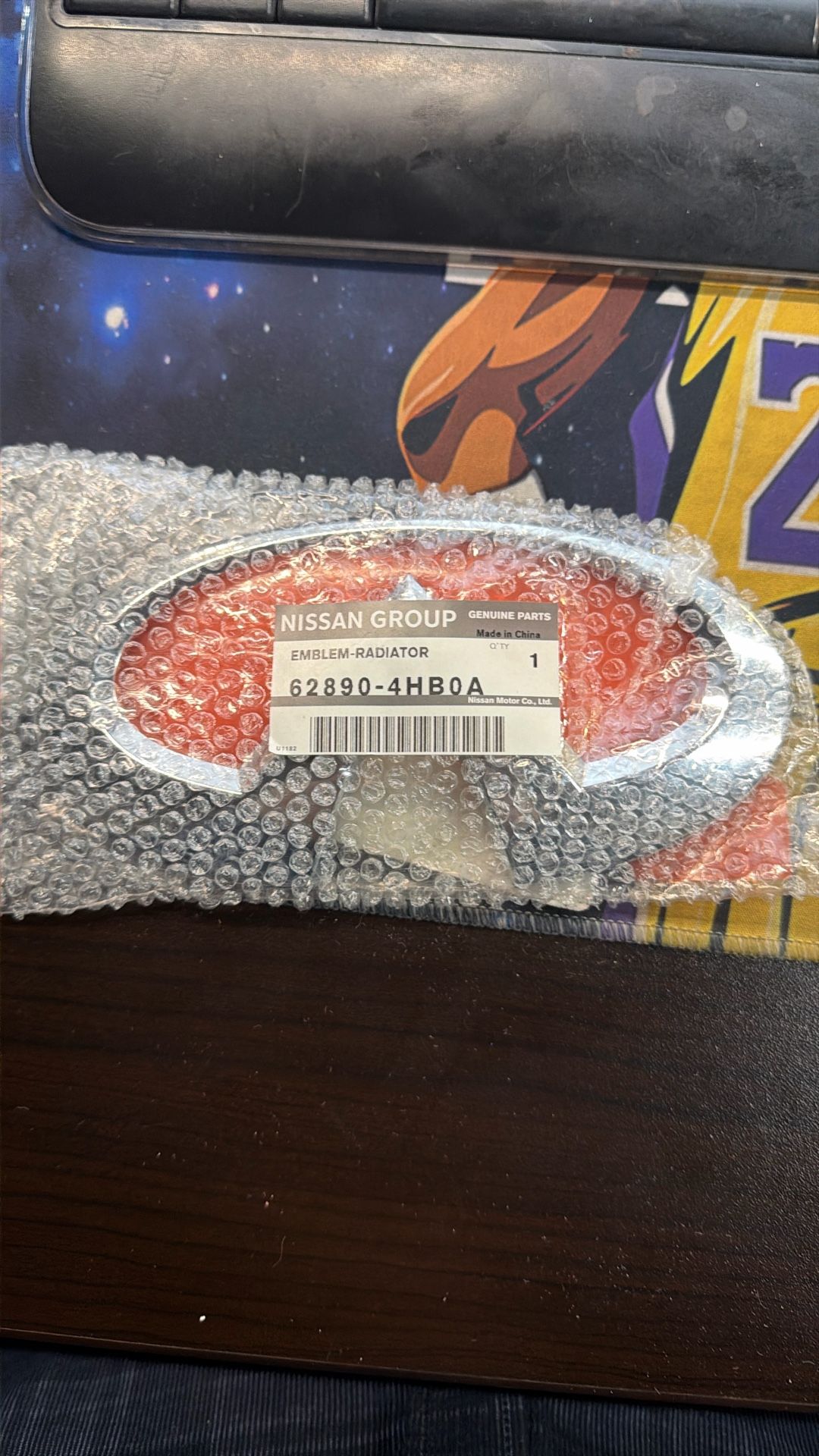 18 -20 Q 50 Front Grille Emblem