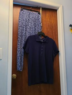 Time and Tru Short Sleeve collared polo shirt w/ half button down front.