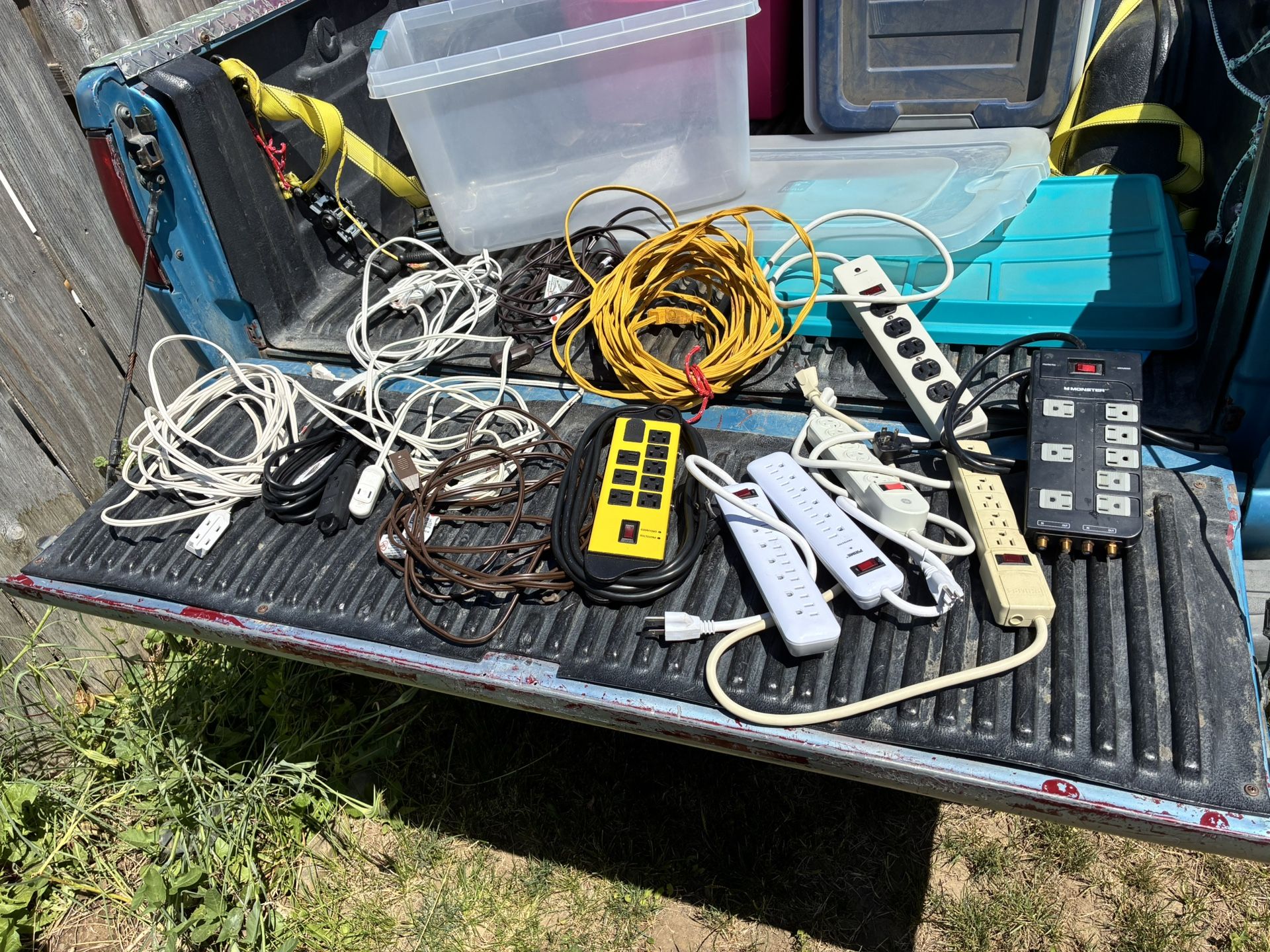 Many extension cords including I believe it’s a 50/75ft yellow outside extension cord and many surge protector multi plug ins. Everything in good shap