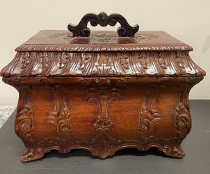 Ornate wood carved decorative box with metal finish.  EUC 