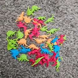 42 Colorful Dinosaur Toys Plastic Figurines 
Approximately 2.5" each
Toys, cake toppers mini dinousaurs
Excellent condition