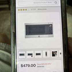 GE Profile 2.2 Cubic Ft Microwave. Brand New. Still in Box.