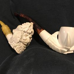 Two  Meerschaum pipes.  The Woodsman and the Eagles Claw.