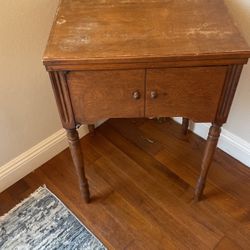 Antique sewing machine table