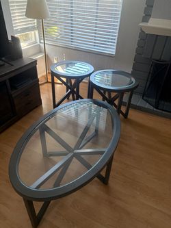 Oval glass top coffee table set
