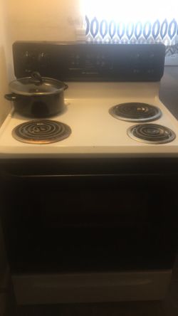 Sofa set 2 end tables and an electric stove