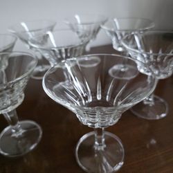 Set of eight vintage Stuart Crystal stemmed champagne or compote dishes with fluted bowls.
