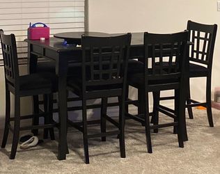 Table with chairs and bench
