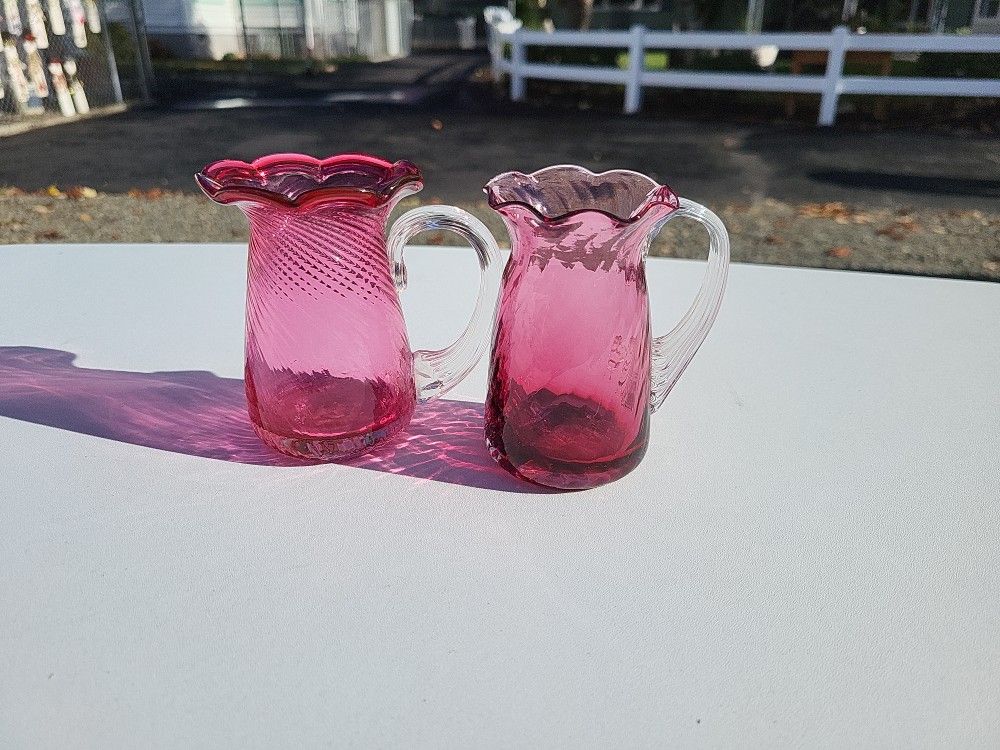 2 Vintage Cranberry glass Pitchers